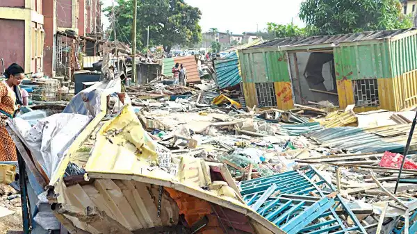 Bulldozers roar … and shop owners mourn